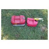 2 fuel cans, one has storage tray and tools
