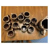 10- Hull mugs, 1- oven proof, and 1- USA pitcher