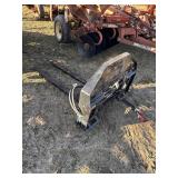 Skid steer hyd adjust forks