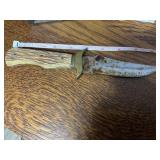 Simulated stag handled knife