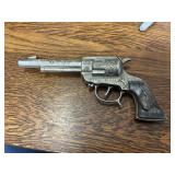 Wild Bill Hickok Marshall cap gun has tape on it