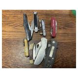 Lot of misc knives some will not open, tips are