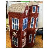 Red brick house. Masd from yarn and plastic