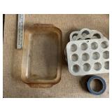 Pyrex cake pan and four cupcake pans