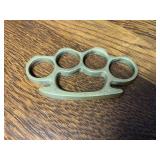 Paper weight/Brass knuckles
