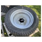 (2) soft turf tires 305-521