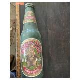 Grizzly Canadian Lager beer bottle display has a