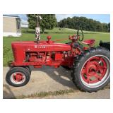 Farmall H tractor. Older restoration tractor is