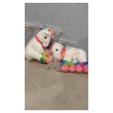 Two Stuffed Unicorns