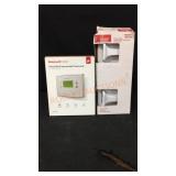 Thermostat and Toilet Paper Holder