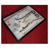 Display Case Of Vintage Jewelry