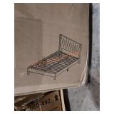 Twin winbacked tufted bed