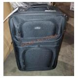 Us traveler rolling luggage