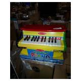 Melissa and Doug learn to play piano