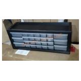 Small plastic storage holder and bins