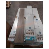 Sure+ waterproof laminate flooring;