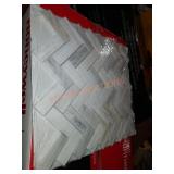 Angora herringbone mosaic tile