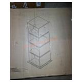 Rotating cube media holder