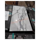 Porcelain 12"x24" tiles. 14sqft/box. 32xthebid