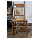 Oak Carved back, cane seat chair