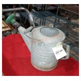 Vintage galvanized watering can