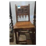 Wooden Plank bottom chair with carved back