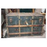 Large vintage steamer trunk and contents