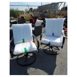 Pair of swivel patio chairs