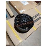 15x7 matte black rim. Offset 15mm hub 56.1mm