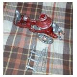 Vintage metal fireman wagon toy