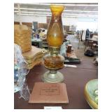 WW11 ration book and oil lamp