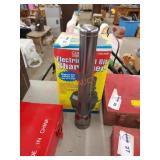 Electric drill hit sharpener and flash light