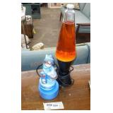Vintage lava lamp and music statue