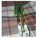 Vintage metal toy wagon with horses
