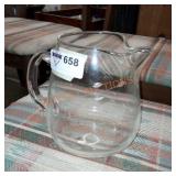 Hand blown glass pitcher