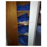 Closet full of moving blankets