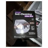 Roll and clean self cleaning litter box