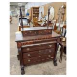 Antique dresser with carved claw and ball feet