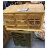 Small vintage screw and bolt containers full of