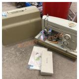 Vintage Kenmore sewing machine and case