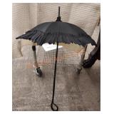 Antique folding parasol made by Arcus
