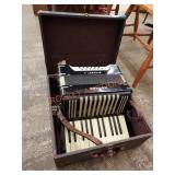 Vintage button Hohner student II accordion