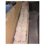 Hanging white rope hammock