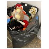 Giant garbage bag full of stuffed animals