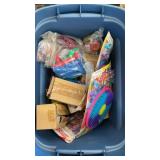 Tote full of misc. prize toys and party favors