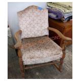 Vintage upholstered wooden rocking chair