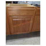 24 W x 34 1/2 H kitchen cabinet stained color