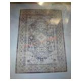 Loomaknoti area rug