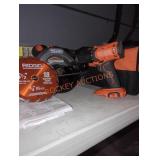 Ridgid 18v 6 1/2 in circular saw and 1/2 in drill