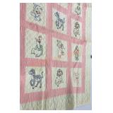 Vintage handmade embroidered baby quilt